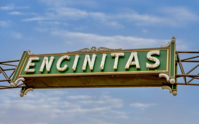 a green sign with white text