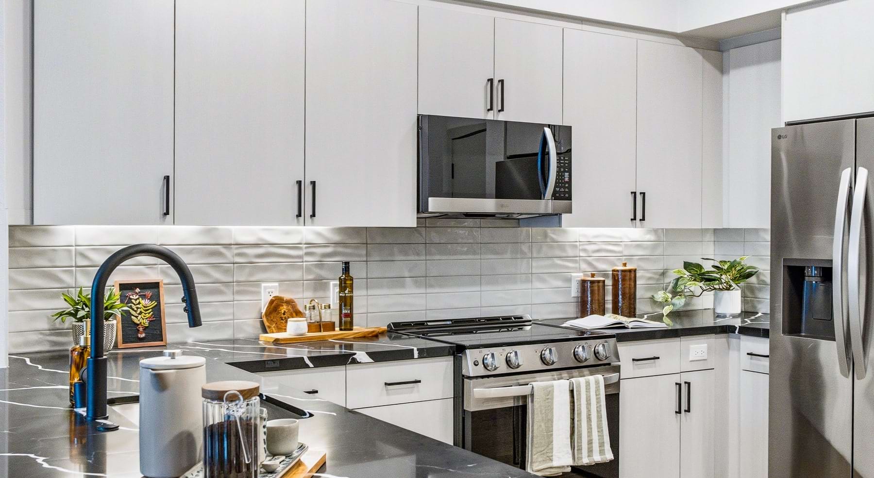 kitchen with white cabinets and stainless steel appliances